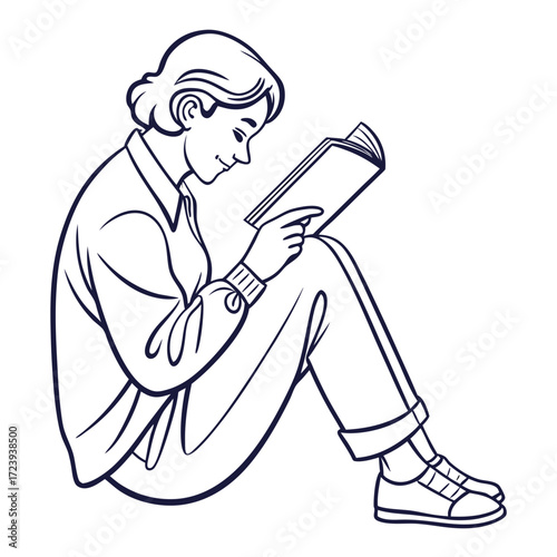 Young woman sitting on the floor with legs crossed reading a book with a smile