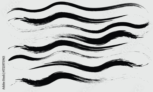 Black ink brush strokes wavy lines on light gray background abstract artistic