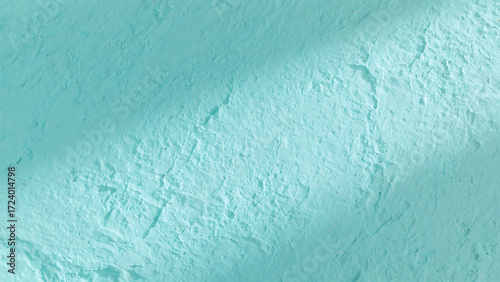 Abstract textured surface with subtle light and shadow interplay in varying shades of teal and aqua creating depth and visual interest for modern design.