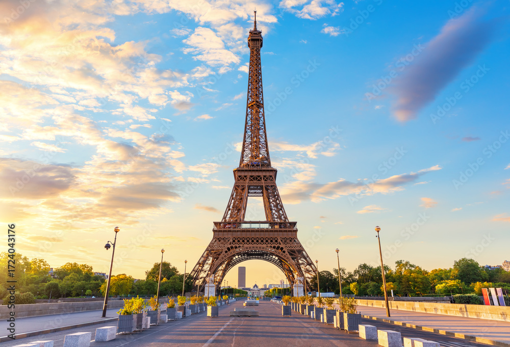 Fototapeta premium Eiffel Tower main close view, symbol of Paris, sunset light