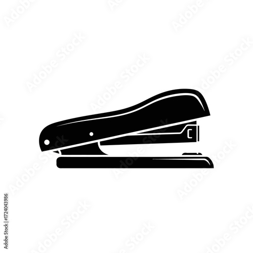 A black and white silhouette of a standard office stapler, viewed from the side.