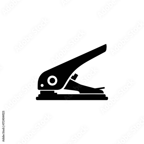 A black silhouette of a single hole puncher on a white background, viewed from the side.