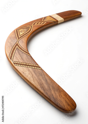 Traditional wooden boomerang on white background