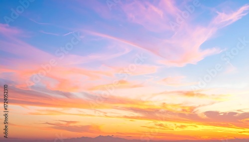 Colorful sunset sky with soft clouds