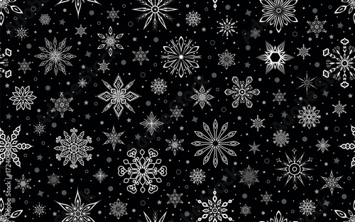 Winter seamless pattern. Festive background with white snowflakes and stars on black. For Christmas and New Year decorations, wallpaper, wrapping paper, fabric, or digital backgrounds