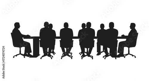 Group of people seated around a table in dark silhouette