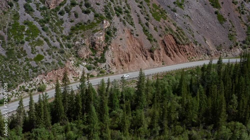 Aerial view of a car on a mountain road