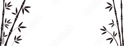 Minimalist dark bamboo stalks with leaves branches