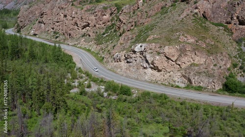 Aerial view of a car on a mountain road