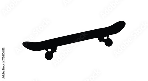 A black skateboard isolated on a white background stark silhouette