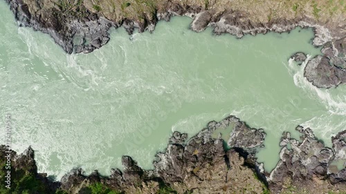 Top view of the mountain river between the rocks in summer