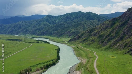 Aerial view of the valley with the river between the mountains