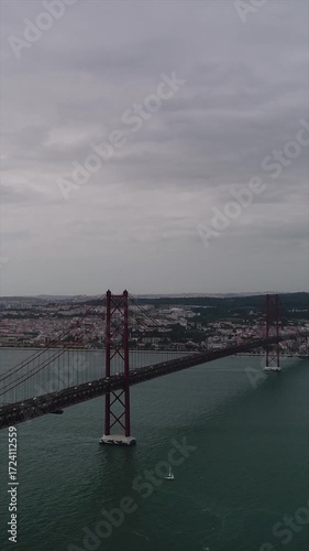 Aerial View of 25 De Abril Bridge Over the Tejo River at Sunset in Lisbon Portugal