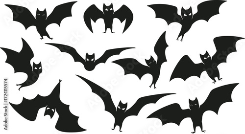 Set of ten black bat silhouette icons in various flying poses with pointed ears for Halloween, horror, or nocturnal design themes
