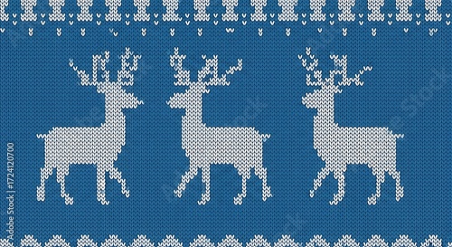 Intricate knitted winter holiday pattern featuring reindeer on a blue backdrop
