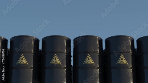 Long row of black oil barrels with petroleum warning signs under clear sky. Concept of global oil trade, geopolitical influence, financial market volatility and energy security.