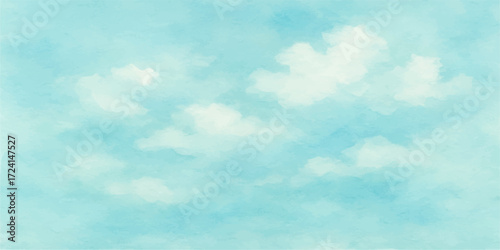 Fluffy white clouds drift across a beautiful bright blue summer sky