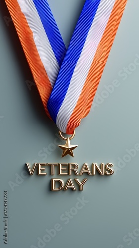 Gold Veterans Day medal with tricolor ribbon on a neutral background.