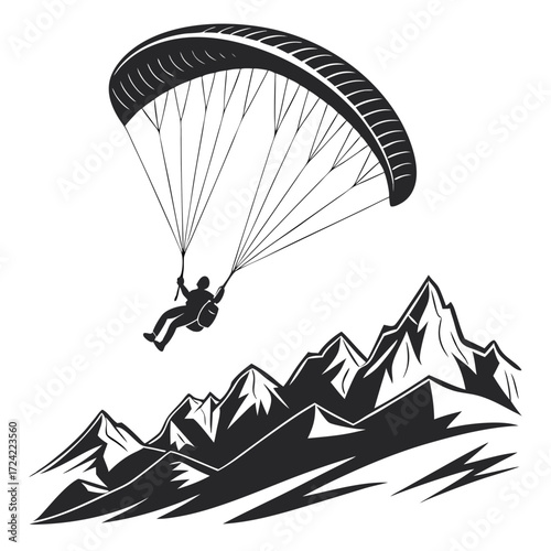 paraglider silhouette in the mountains