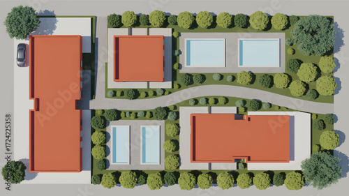 Aerial view of a modern residential complex with orange roofed buildings and green landscaping in a clear silhouette