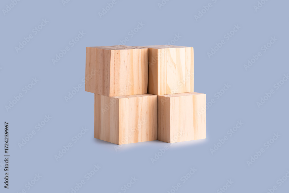 Obraz premium Four wooden cubes