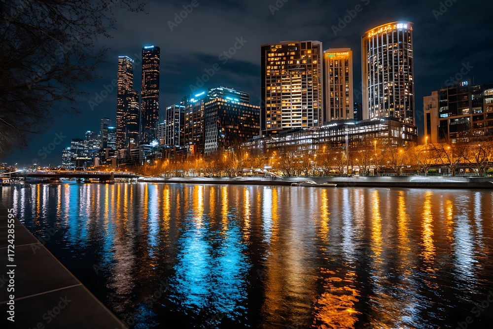 Obraz premium Stunning Night View of Melbourne Skyline with Reflection in Yarra River Water