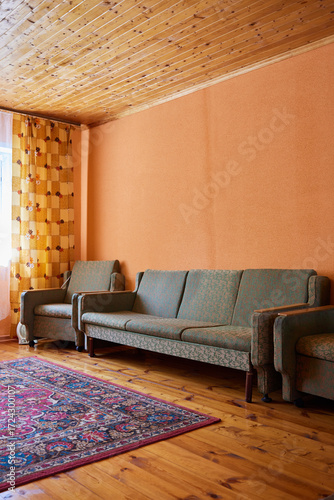 old soviet living room with sofa in dacha