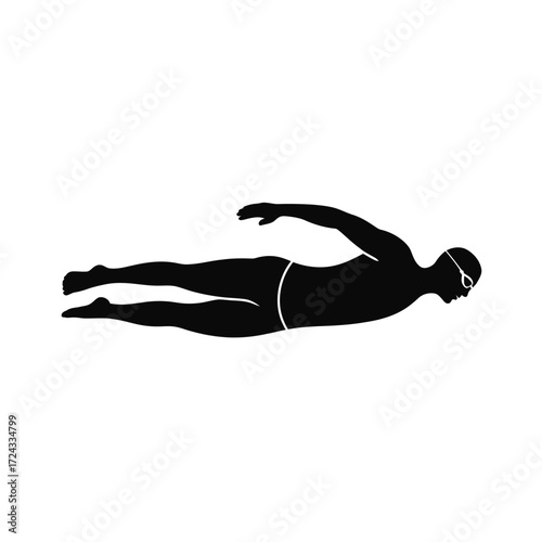 Silhouette of a male swimmer in butterfly stroke swimming