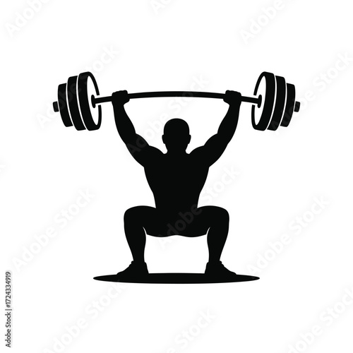 Silhouette of a man lifting a heavy barbell weightlifting
