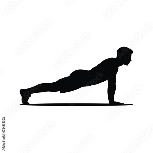 Silhouette of a person performing a push-up exercise