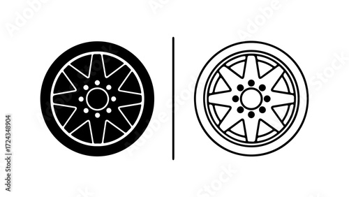 Two car wheels one black and white outline.