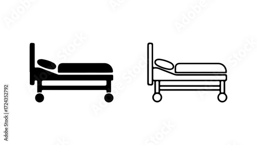 Two hospital beds one black and one white side view medical equipment healthcare resting.