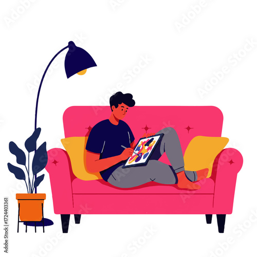 A young man is relaxing on a pink couch, drawing colorful abstract art on a digital tablet with a stylus.