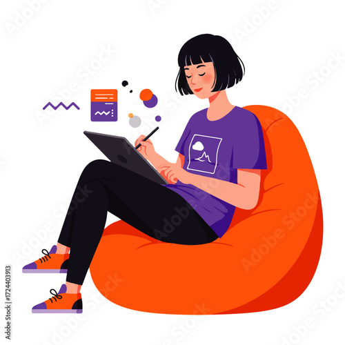 A young woman with short black hair sits in an orange beanbag chair, drawing on a tablet with a stylus.