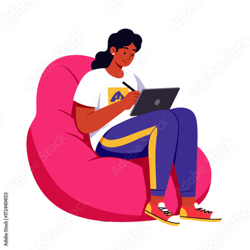 A young woman sits in a pink beanbag chair, drawing on a tablet with a stylus pen.