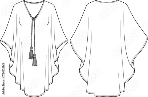 a women's white kaftan blouse with a plunging V-neckline and decorative tassels, perfect for summer resort wear.