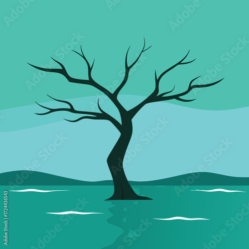 Dark silhouette of a bare tree on teal water and sky