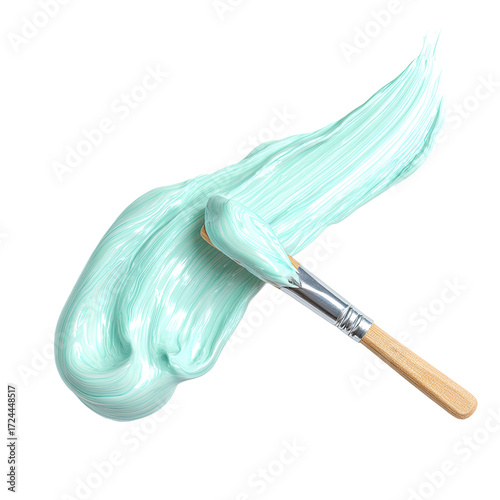 Light teal paint or cosmetic substance being applied with a paintbrush