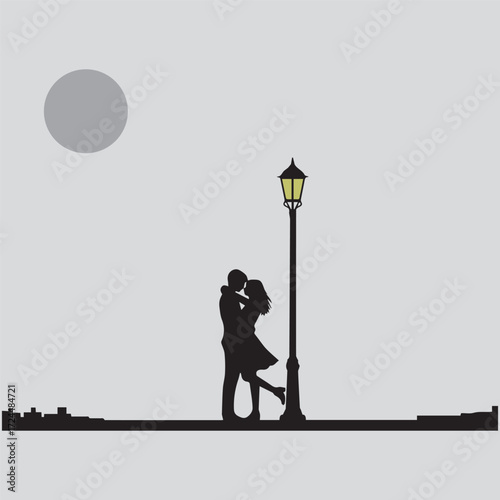 Silhouette of a romantic couple kissing under a street lamp at night with a full moon and starry sky in the background