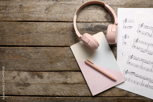 Music sheets, modern headph...