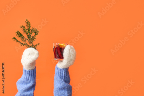 Female hands in mittens hol...