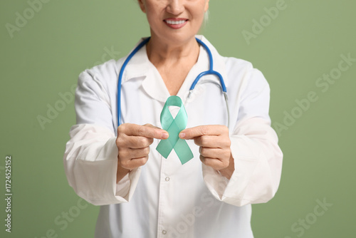 Mature female doctor with t...