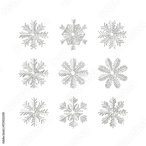 Decorative silver snowflake patterns on a white background for winter celebration