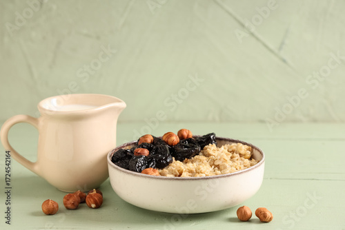 Bowl of tasty oatmeal with ...