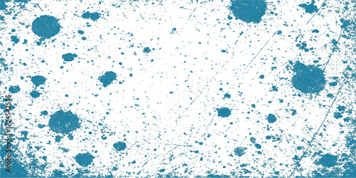 Vibrant blue watercolor splashes and ink stains create a liquid texture pattern on a glass backdrop