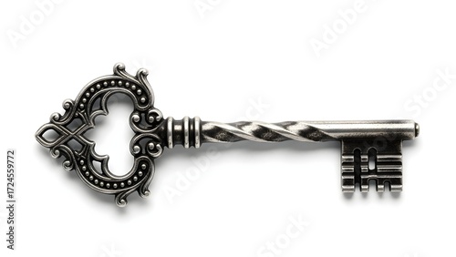 An ornate, vintage gothic skeleton key with a detailed, decorative bow, isolated on a pristine white background