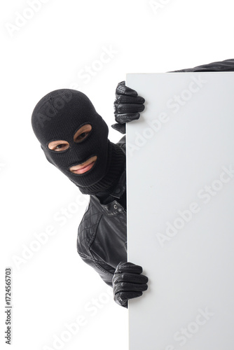 Male thief with blank poste...