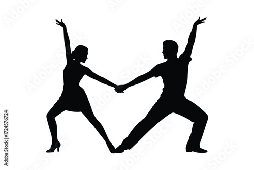 Silhouette of a dancing couple in a dynamic pose