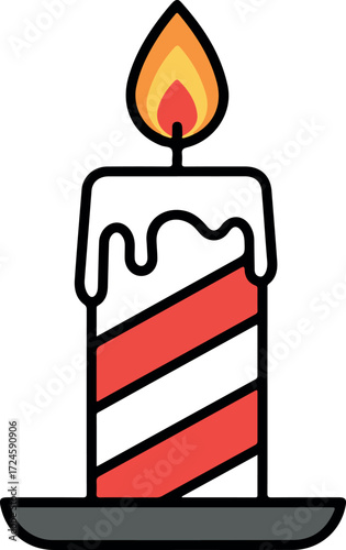 Festive candle with red and white stripes burning brightly on a dark plate.