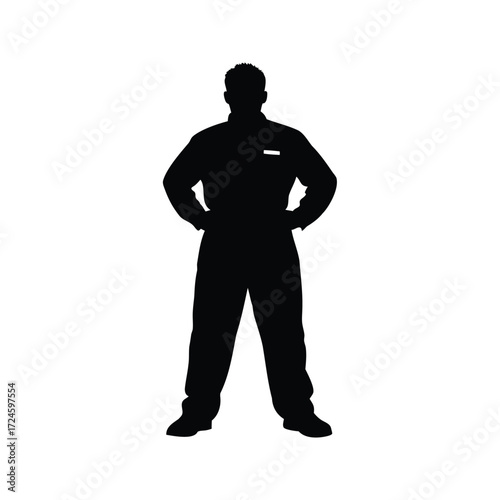 Silhouette of a person in overalls with hands on hips, standing confidently, mechanic in coveralls silhouette vector illustration